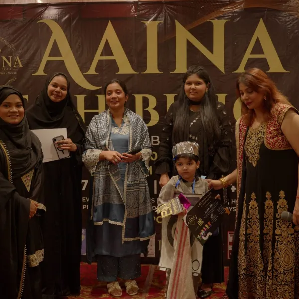 A young participant in costume with the Busiqueens team